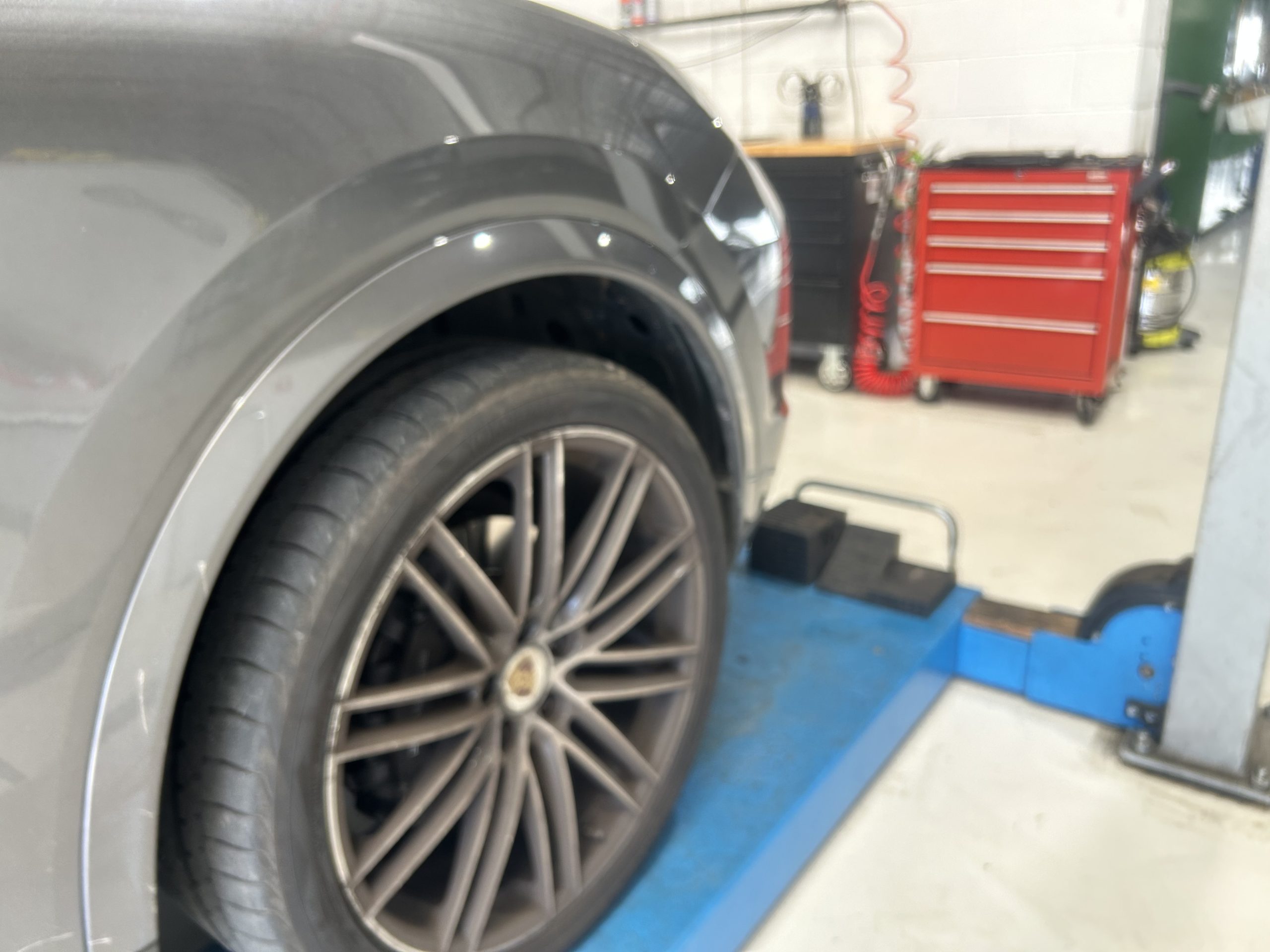 Porsche on the hoist at North Star Motors